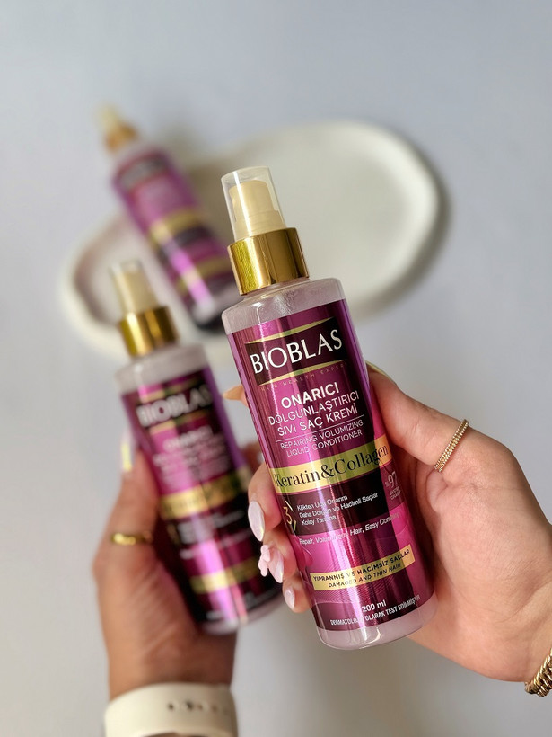 اسپری دوفاز ضد ریزش مو بیوبلاس حاوی کراتین و کلاژن