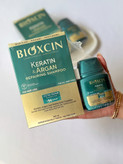 شامپو بیوکسین حاوی کراتین و آرگان، ترمیم کننده و تقویت کننده مو