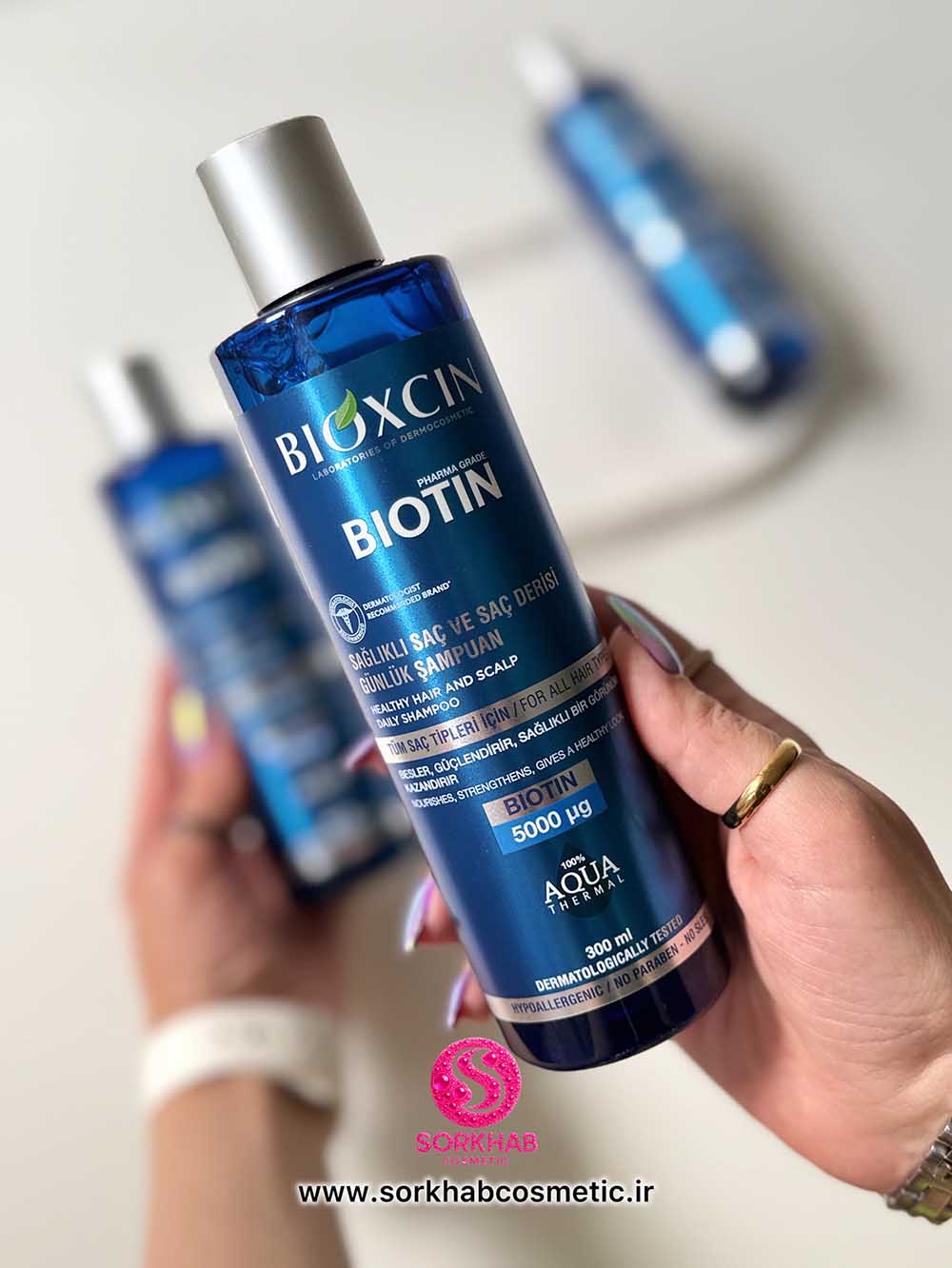 شامپو ضد ریزش مو بیوکسین مدل بیوتین ( BIOTIN )